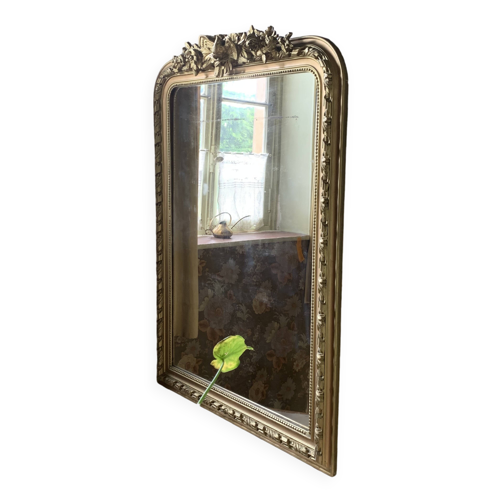 Gilded wooden fireplace mirror with pediment