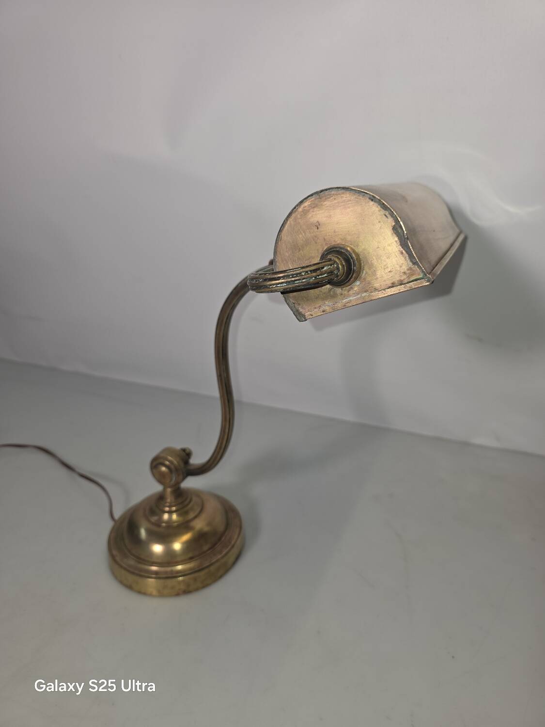Antique brass desk lamp from a notary.