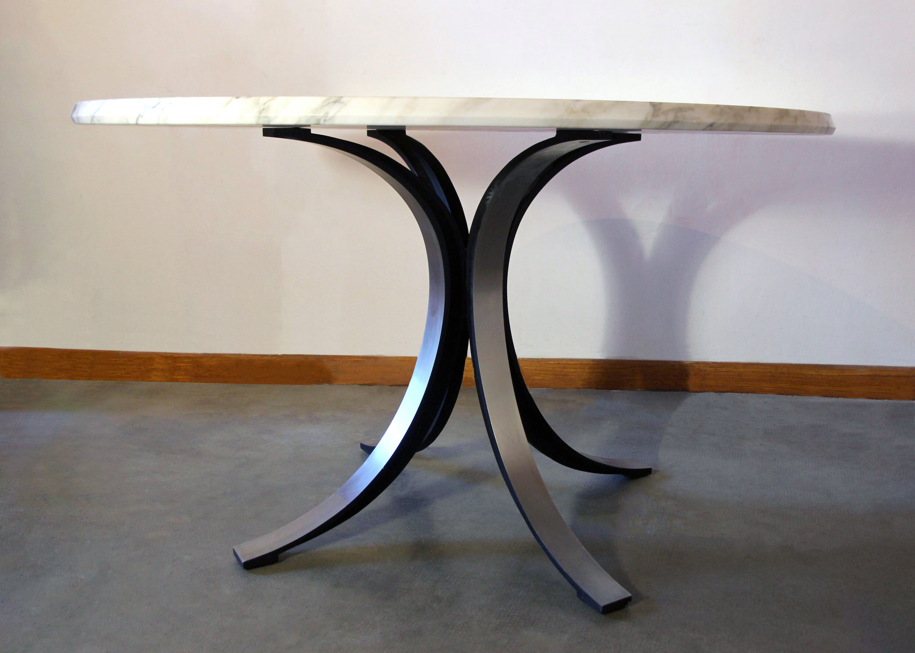 Table T69 in marble by Osvaldo Borsani and Eugenio Gerli published by Tecno