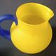TWO VINTAGE YELLOW AND BLUE GLASS PITCHERS 1990