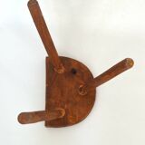 Half-moon tripod stool
