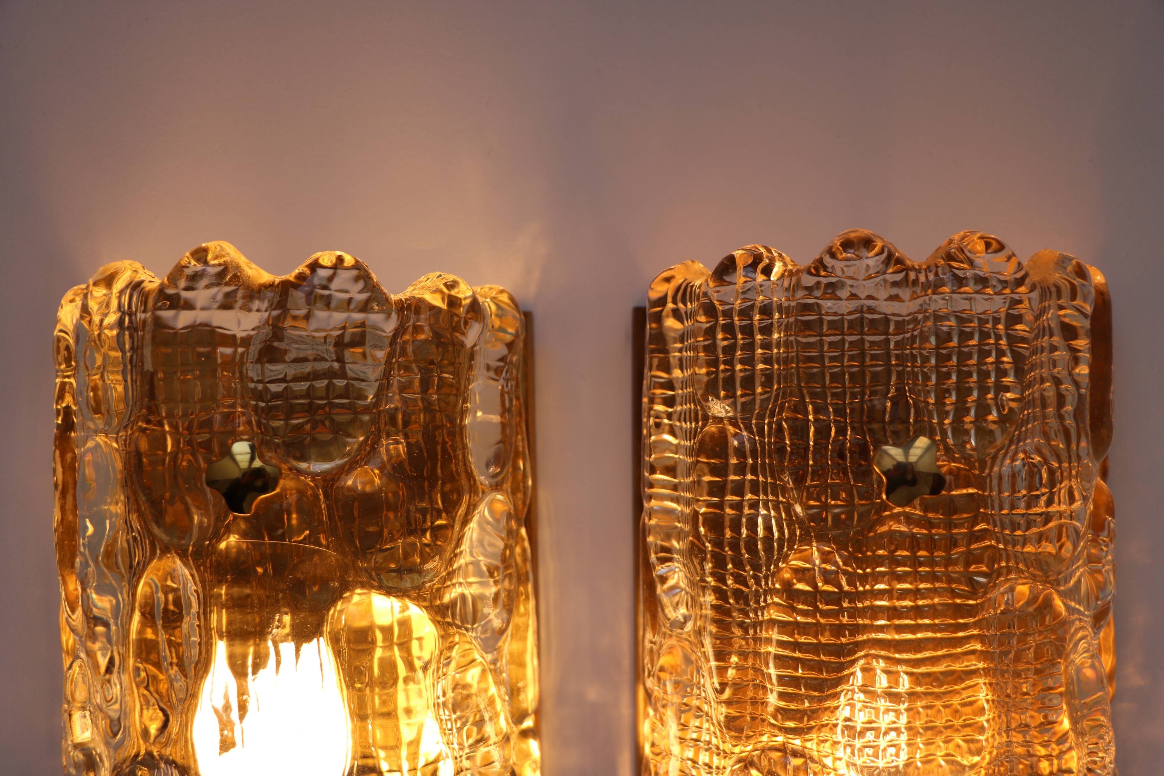 Pair of glass and brass wall lights by Carl Fagerlund for Orrefors, 1960.