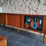 Vintage row with sliding doors and ceramic decoration