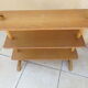 Vintage rattan shelf on feet