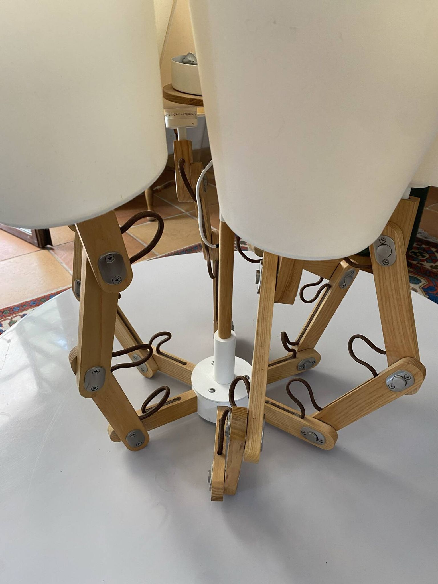 Scandinavian chandelier with articulated arms