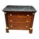 Empire chest of drawers with half columns in mahogany and gilded bronze