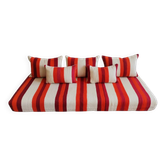 Set of covers for cream and red Moroccan floor sofa.