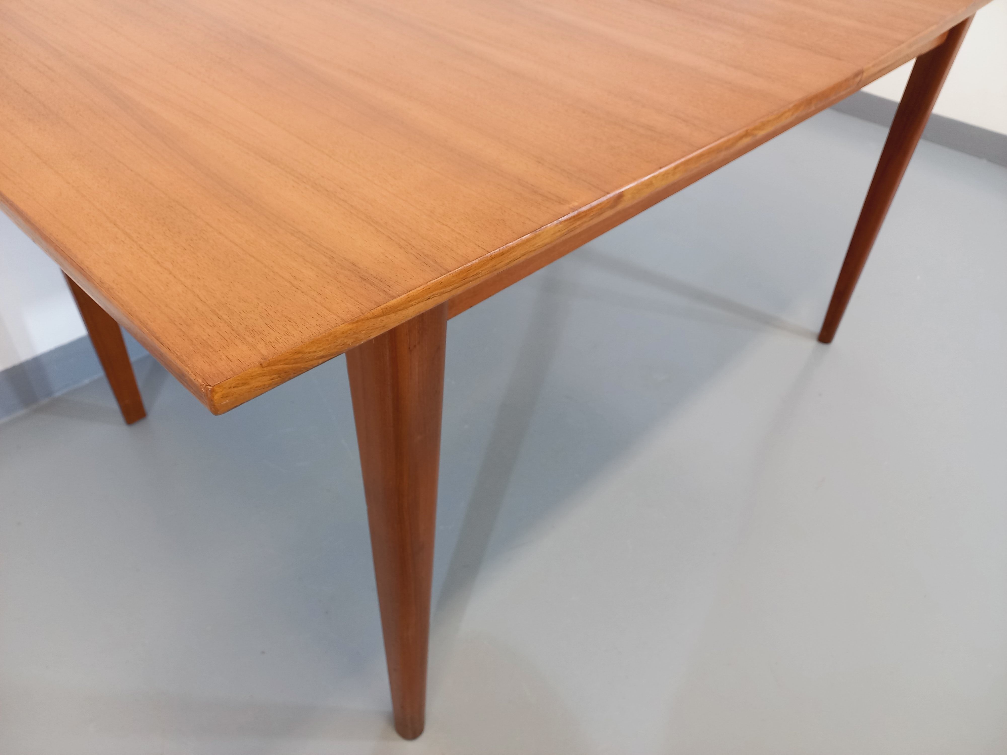 Vintage Scandinavian dining table from 50s 60s teak with extension