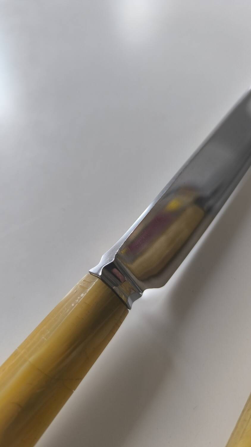 Set of 12 bakelite and stainless steel knives