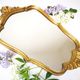 Baroque-style wall mirror / H49 cm x 30 cm /Decor shell and foliage / Golden with gold leaf