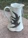 Jade green ceramic barbotine vase with swallows.