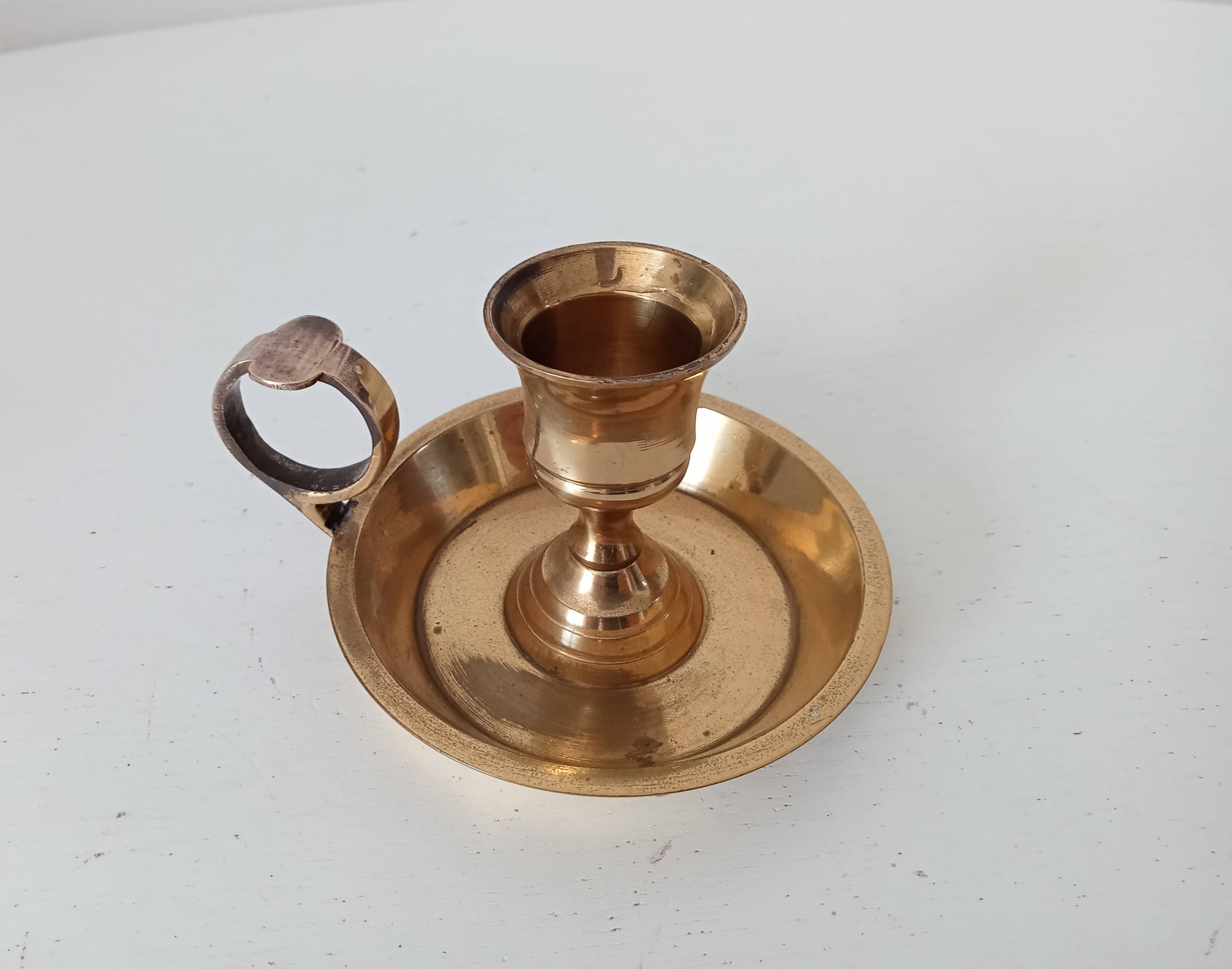 Vintage hand candle holder in solid golden brass