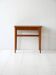 Scandinavian vintage teak nightstand with slatted shelf