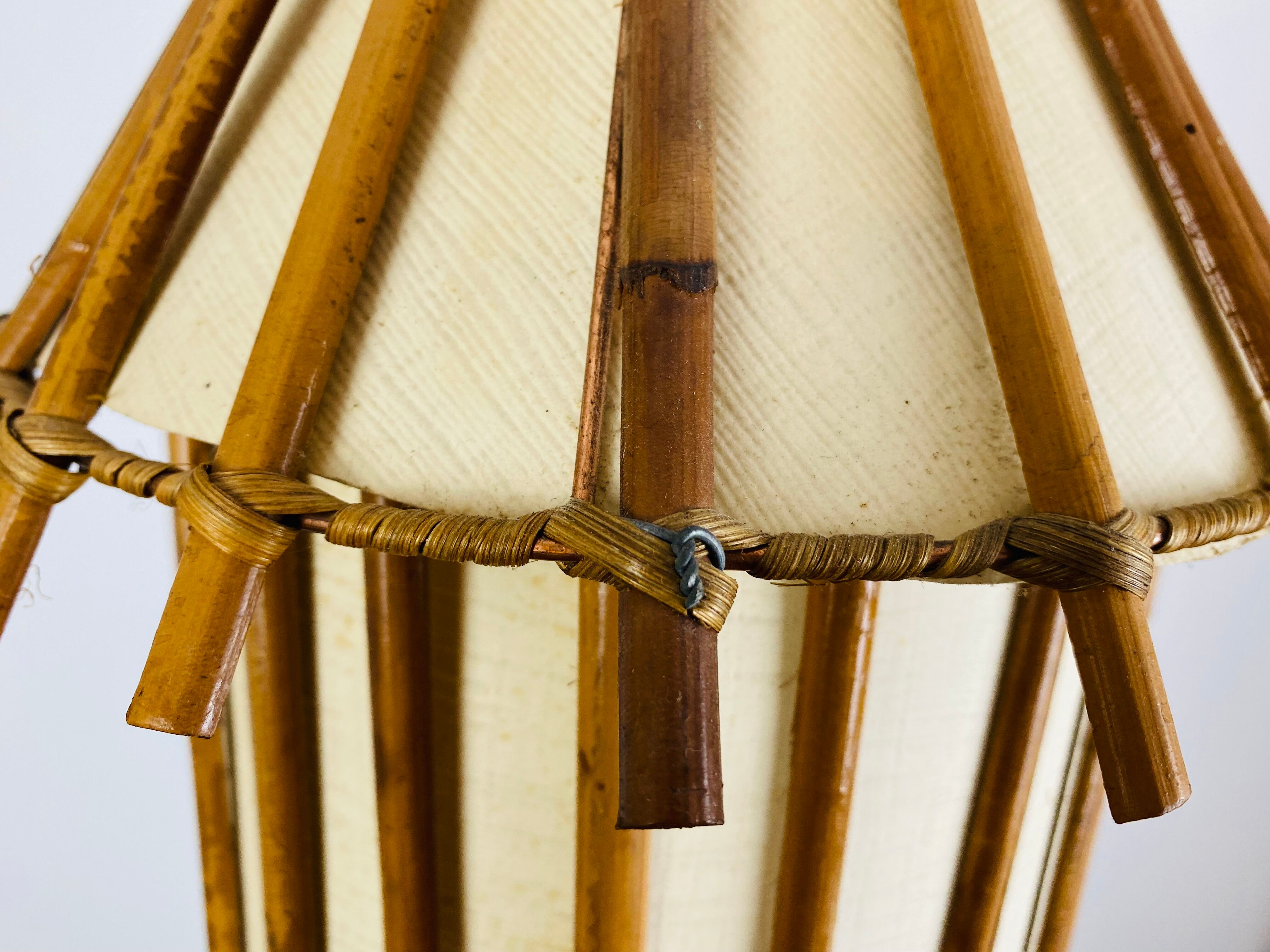 Suspension rotin vintage années 60