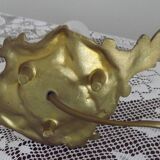 Vintage French bronze Wee Willie Winkie style lamp with red card shade.