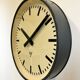 Grey industrial factory wall clock from pragotron, 1960s