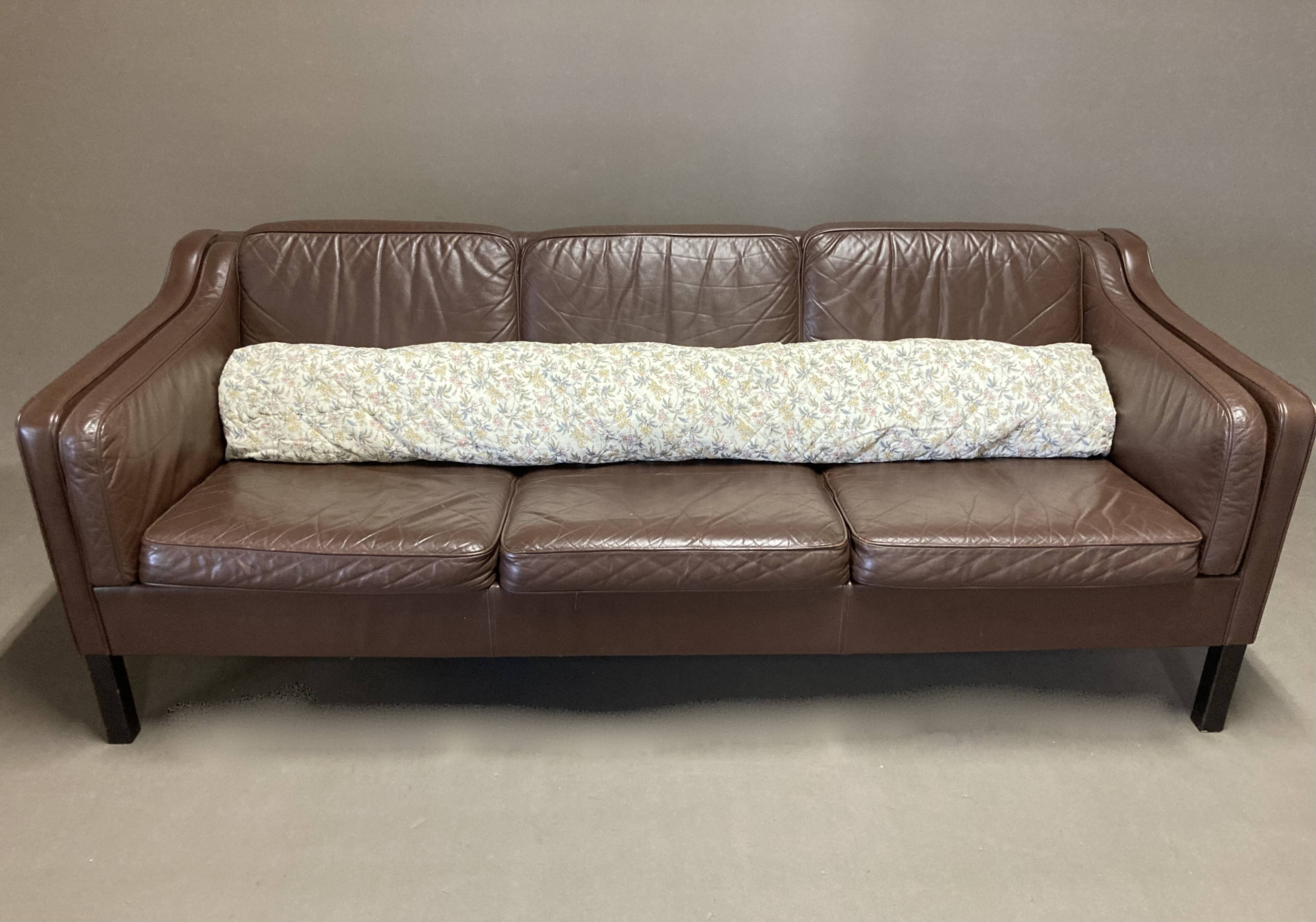 Scandinavian design 3-seater leather sofa.
