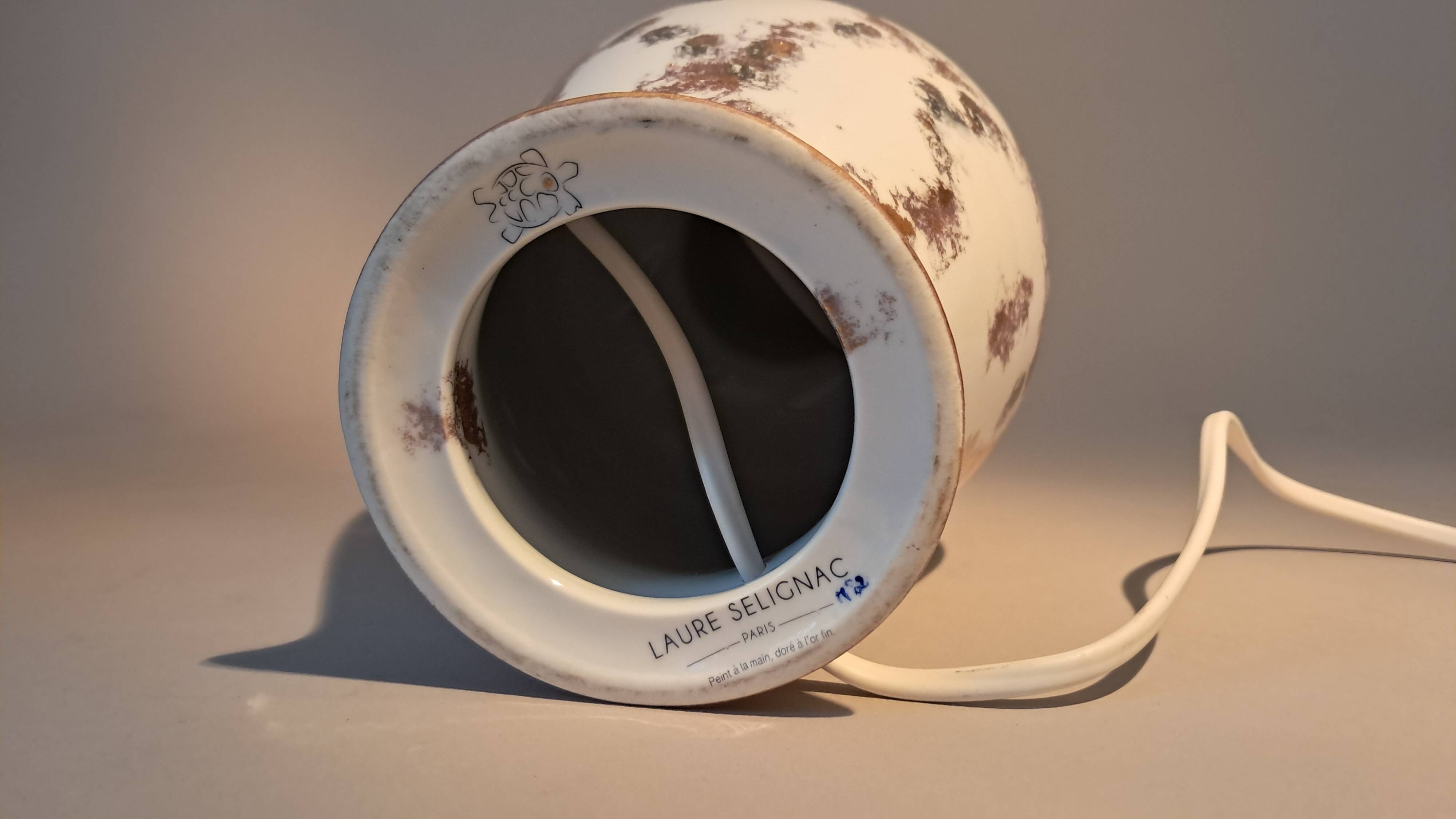 Fine porcelain lamp gilded with gold by Laure Selignac, Paris.