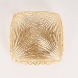 Pairs of amber glass wall lights in the shape of a fingerprint, Germany, 1970s.