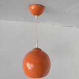 Pair of 70's globes in orange lacquered metal.