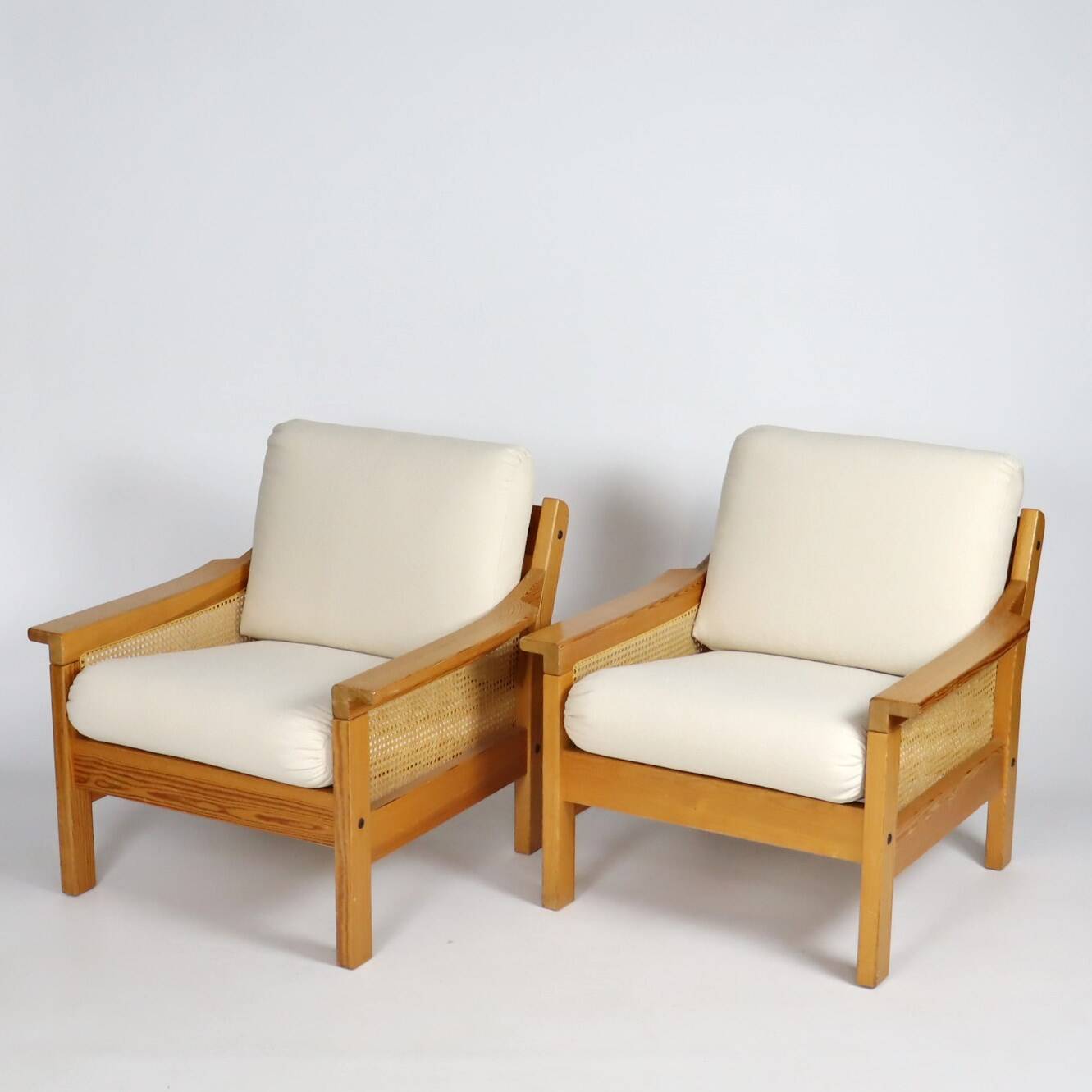 Pair of 70s cane and pine armchairs