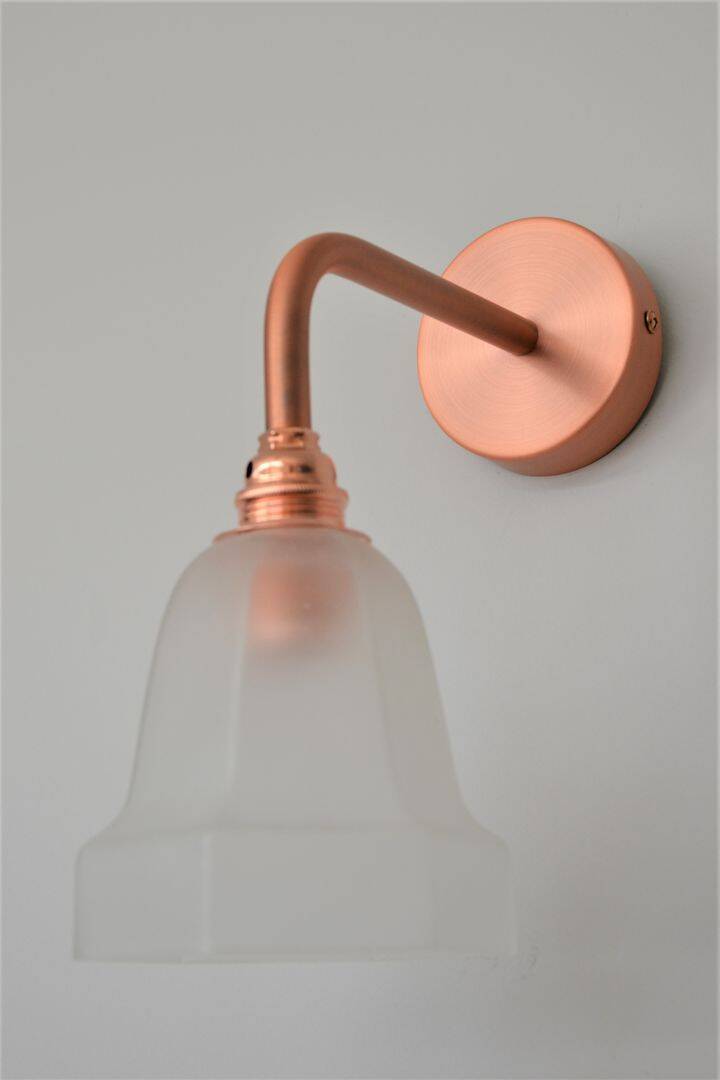 Frosted glass wall light and copper support