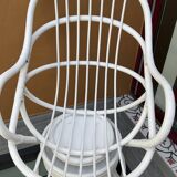 White rattan swivel chair