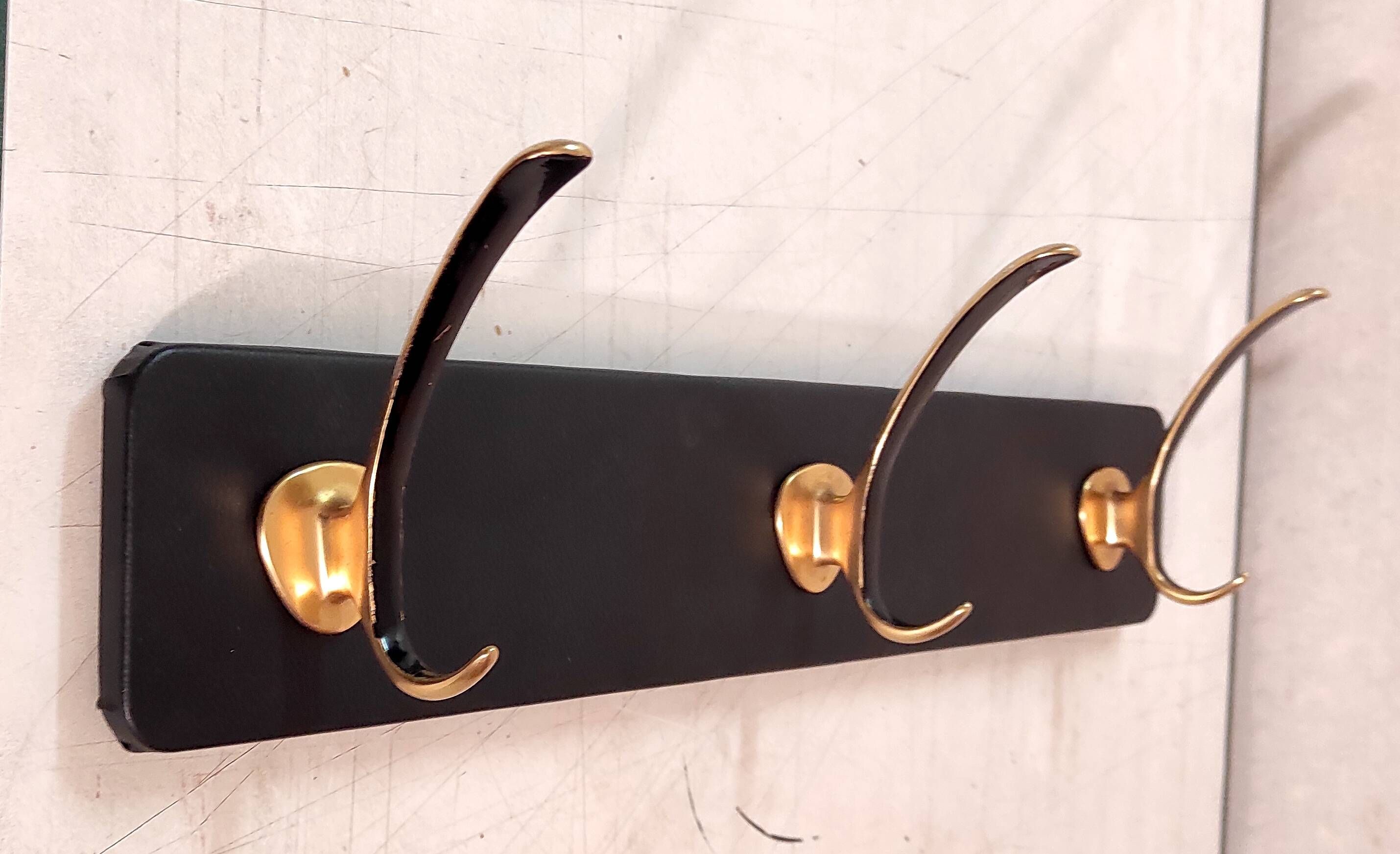 Wall-mounted coat rack in brass, 1950s-60s