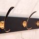 Wall-mounted coat rack in brass, 1950s-60s