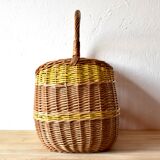 Vintage wicker basket crossed with a yellow scoubidou