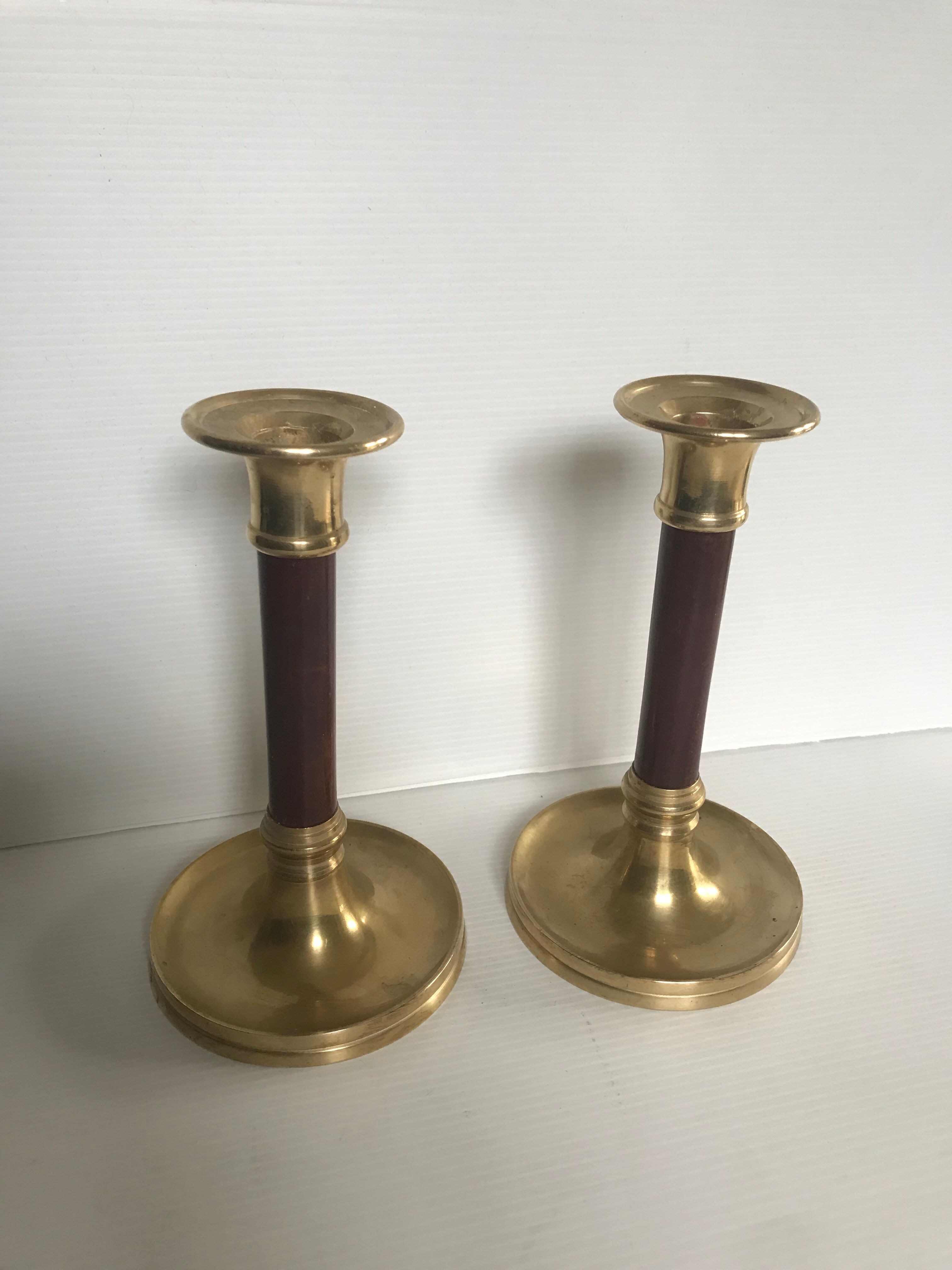 Pair of Scandinavian brass and teak candle holders