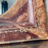 Antique leather framed mirror with gildings 30 cm x  24 cm