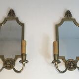 Pair of mirror and bronze wall lamps with lions' heads, french work. around 1940