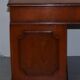 Partner desk with double pedestal in burr yew wood with decorated top.