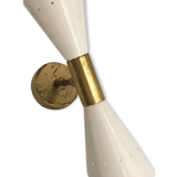 Pair of wall sconces remembering the Italian creations from the 50s and 60's