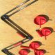 vintage black and red iron coat rack