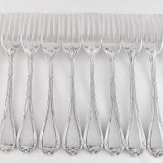 CHRISTOFLE 1907-1935 - 12 table forks and 12 Louis XVI style table spoons, Rubans model
