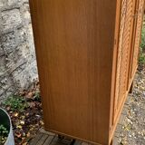 Rattan wardrobe and its compass-legged chest of drawers, 1960
