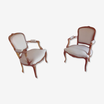 Pair of Louis XV convertible armchairs