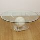 Vintage round coffee table in lucite and marbled glass.