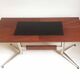 Vintage coffee table from the 1950s in mahogany and metal, with a tabletop width of 110 cm.