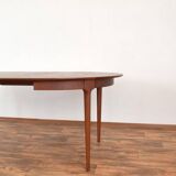 Table à manger extensible en teck danois du milieu du siècle, années 1960.