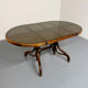 Vintage dining table with a cane top by Mundus from the 1970s.