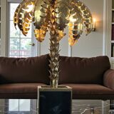 Lampe palmier en metal doré avec socle en plaque de verre style année 70