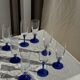 Set of 6 blue-footed champagne flutes; 3 pairs of designs.