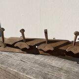 Wooden wall-mounted coat rack