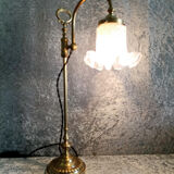 Adjustable brass desk lamp with frosted glass tulip