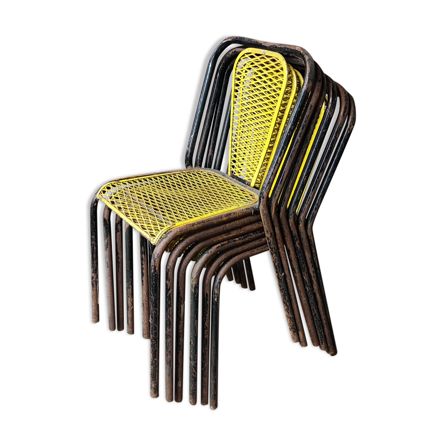 Six chaises en métal perforé seducta René Malaval