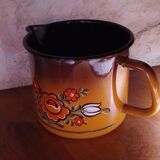 Vintage enameled pitcher