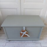 Toy chest on wheels patinated green of gray